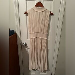 Nanette Lepore pleated dress. Never worn. Perfect for a baby shower or event.